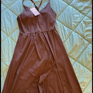 New HALARA dress/ racer back / pockets on both sides/ built in “sports bra”